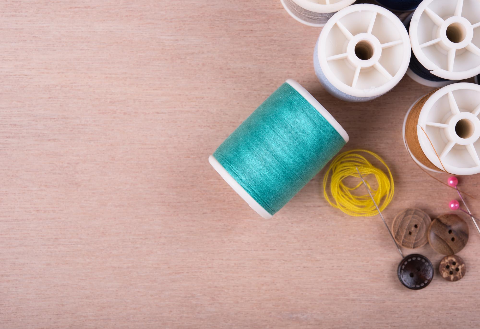 Series of thread spools and finished samples